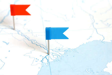 Flags on a outline map, close-upの写真素材