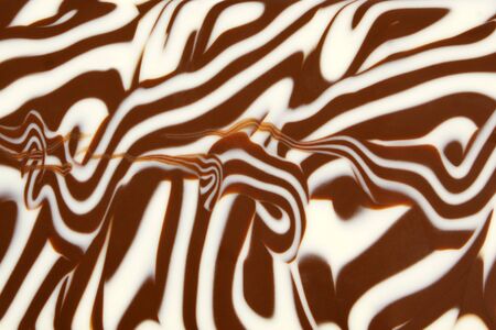 White and black chocolate, for backgrounds or texturesの写真素材
