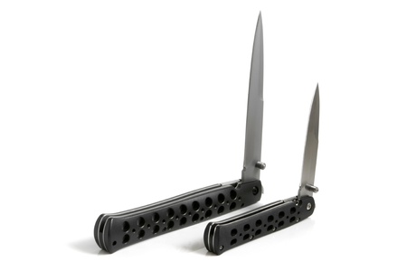 Clasp knifes on a white backgroundの写真素材