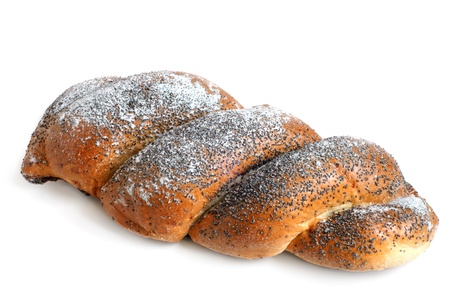 Twisted bread with poppyseed on a white backgroundの写真素材