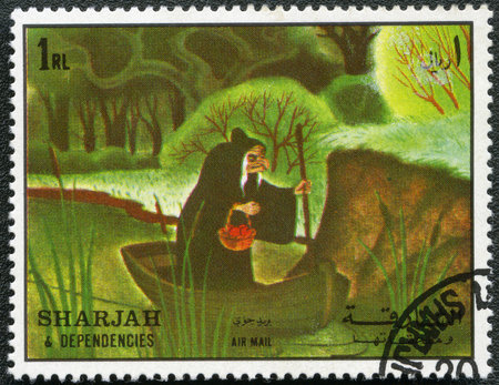 SHARJAH & DEPENDENCIES - CIRCA 1972: A stamp printed by Sharjah & Dependencies devoted fifty years of Walt Disney cartoon characters, shows Wicked Queen のeditorial素材