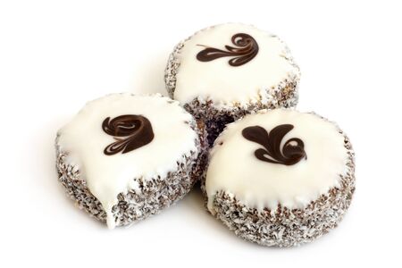 Cookies in chocolate on a white backgroundの写真素材