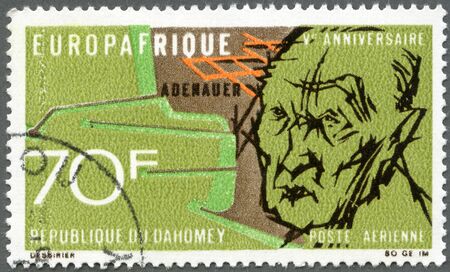 REPUBLIC OF DAHOMEY - CIRCA 1968: A stamp printed in Republic of Dahomey shows Konrad Adenauer (1876-1967), 5th anniversary of the economic agreement between the European Economic Community and the African and Malagasy Union, circa 1968の写真素材