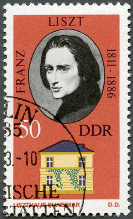 GERMANY - CIRCA 1973: A stamp printed in Germany shows Franz Liszt (1811-1886) and his Home in Weimar, circa 1973のeditorial素材