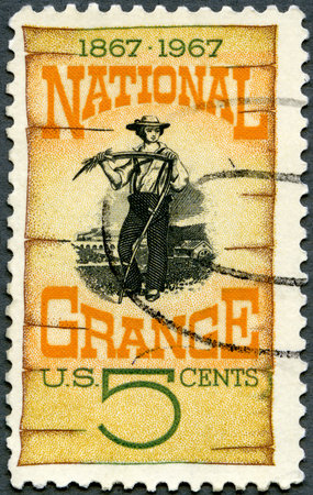 USA - CIRCA 1967: A stamp printed in USA shows Grange Poster, 1870, Centenary the founding of the National Grange, American farmers organization, circa 1967のeditorial素材