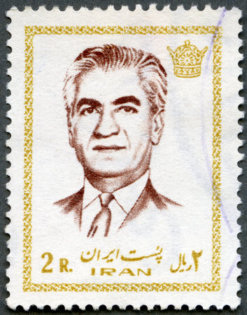 IRAN - CIRCA 1972: A stamp printed in Iran shows Mohammad Reza Shah Pahlavi, circa 1972のeditorial素材