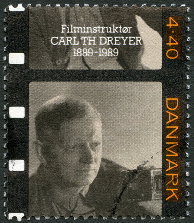 DENMARK - CIRCA 1989: A stamp printed in Denmark shows Carl Th. Dreyer (1889-1968), screenwriter and director, circa 1989のeditorial素材
