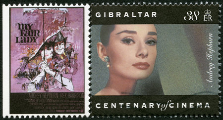 GIBRALTAR - CIRCA 1995: A stamp printed in Gibraltar shows Audrey Hepburn (1929-1993), actress, circa 1995のeditorial素材