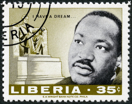 LIBERIA - CIRCA 1968  A stamp printed in Liberia shows Martin Luther King Jr   1929 - 1968 , American civil rights leader, and Lincoln monument by Daniel Chester French, circa 1968のeditorial素材