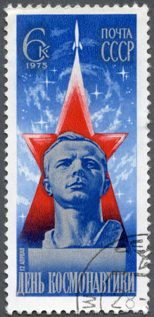 USSR - CIRCA 1975: A stamp printed in USSR shows Yuri A. Gagarin by L. Kerbel, Cosmonauts Day, circa 1975のeditorial素材