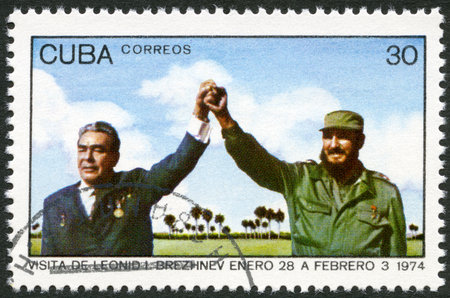 CUBA - CIRCA 1974: A stamp printed in Cuba shows Leonid Brezhnev and Fidel Castro, devoted Visit of Leonid I. Brezhnev to Cuba, January 28-February 3, circa 1974のeditorial素材
