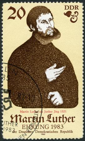 GERMANY - CIRCA 1982  A stamp printed in Germany shows Portrait of Martin Luther  1483-1546 , Eisenach, 1521, circa 1982のeditorial素材