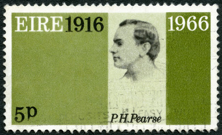 IRELAND (EIRE) - CIRCA 1966: A stamp printed in Ireland shows Patrick Henry Pearse (1879-1916), 50th anniversary of the Easter Week Rebellion, and to honor the signers of the Proclamation of the Irish Republic, circa 1966のeditorial素材