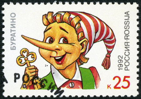 RUSSIA - CIRCA 1992: A stamp printed in Russia shows Buratino, series Characters from Children's Books, circa 1992のeditorial素材