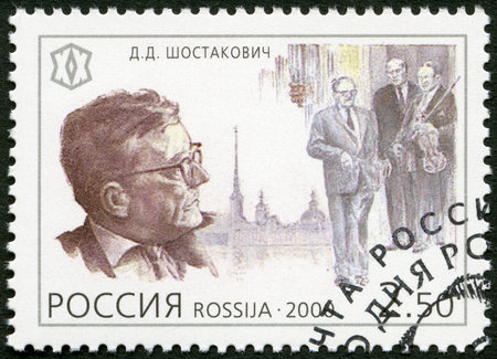 RUSSIA - CIRCA 2000: A stamp printed in Russia shows Dmitry D. Shostakovich (1906-1975), composer, series National Cultural Milestones in the 20th Century, circa 2000のeditorial素材