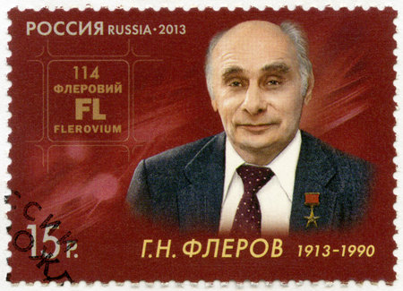RUSSIA - CIRCA 2013: A stamp printed in Russia shows Georgy N. Flerov (1913-1990), nuclear physicist, the 100th birth anniversary, circa 2013のeditorial素材