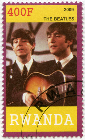 RWANDA - CIRCA 2009: A stamp printed in Republic of Rwanda shows The Beatles, John Lennon and Paul McCartney, circa 2009のeditorial素材
