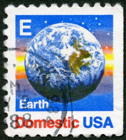 USA - CIRCA 1988: A stamp printed in USA shows Earth, circa 1988の写真素材