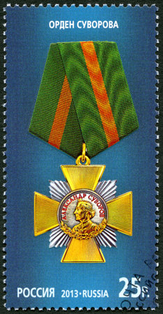 RUSSIA - CIRCA 2013: A stamp printed in Russia shows The Order of Suvorov on the blue background, series State decorations of the Russian Federation, circa 2013のeditorial素材