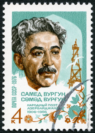 USSR - CIRCA 1976: A stamp printed in USSR shows Samad Vurgun (1906-1956), national poet of Azerbaijan, and derrick, circa 1976のeditorial素材
