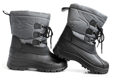 Children winter boot on a white backgroundの写真素材