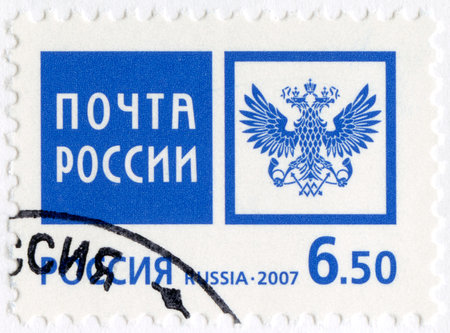 RUSSIA - CIRCA 2007: A stamp printed in Russia shows Emblem of the Russian Post Office, circa 2007のeditorial素材