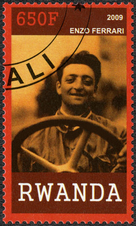 RWANDA - CIRCA 2009: A stamp printed in Republic of Rwanda shows portrait of Enzo Ferrari...