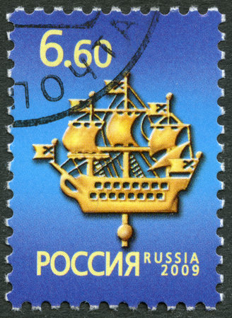 RUSSIA - CIRCA 2009: A stamp printed in Russia dedicated ship on admiralty steeple symbol of Saint-Petersburg, circa 2009のeditorial素材