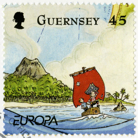 GUERNSEY - CIRCA 2010: A stamp printed in Guernsey shows illustration the adventures of Penny the Postie,by Keith Robinson, circa 2010のeditorial素材