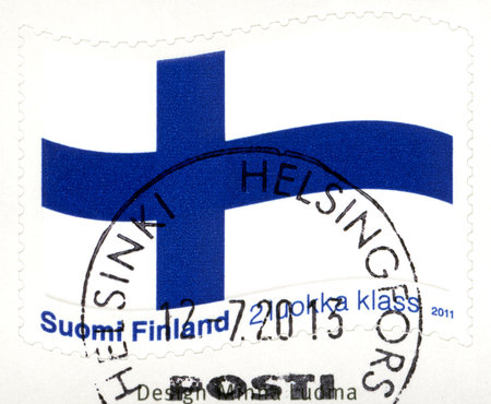 FINLAND - CIRCA 2011: A stamp printed in Finland shows the Finnish flag, the Blue Cross flag, circa 2011のeditorial素材