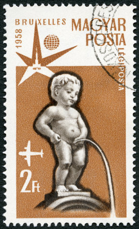 HUNGARY - CIRCA 1958: A stamp printed in Hungary shows Manneken Pis, Fountain, Brussels, circa 1958のeditorial素材