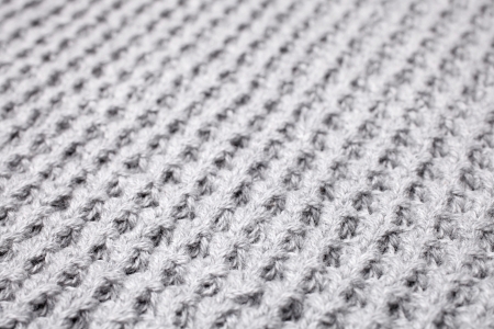 Knitted fabric  soft focus  - macro of a woolen texture