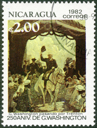 NICARAGUA - CIRCA 1982: A stamp printed in Nicaragua shows George Washington (1732-1799), Riding through Trenton, 250th birth anniversary, circa 1982のeditorial素材