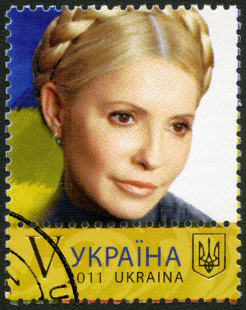 UKRAINE - CIRCA 2011: A stamp printed in Ukraine shows Yulia Tymoshenko, circa 2011のeditorial素材