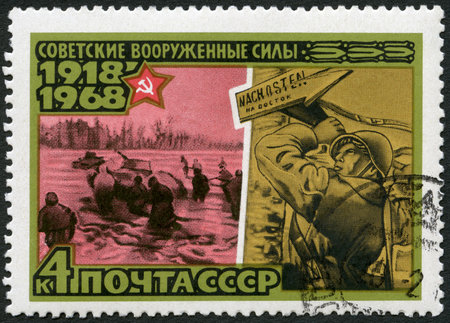 USSR - CIRCA 1968: A stamp printed in USSR shows Poster "Eastward", defeat of German army, series 50th anniversary of the Armed Forces of the USSR, circa 1968のeditorial素材