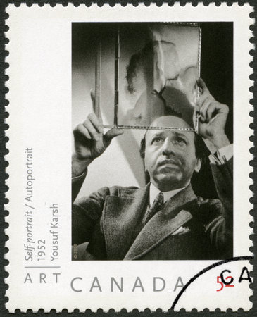 CANADA - CIRCA 2008: A stamp printed in Canada shows self-portrait of Yousuf Karsh (1908-2002), 1952, portrait photographer, circa 2008のeditorial素材