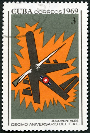 CUBA - CIRCA 1969: A stamp printed in Cuba shows Documentaries, devoted National Film Industry, 10th anniversary, circa 1969のeditorial素材