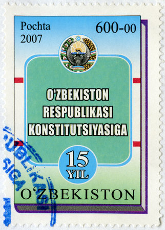 UZBEKISTAN - CIRCA 2007: A stamp printed in Uzbekistan dedicated the 15th anniversary of the Uzbekistan Constitution, circa 2007のeditorial素材