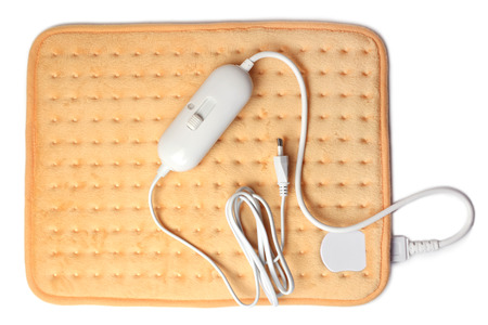 Electric heating pad on white backgroundの写真素材