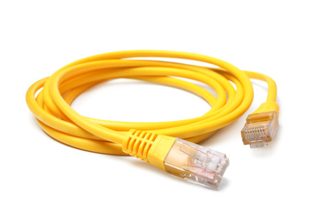 Network  cable with RJ45 connectors on white background