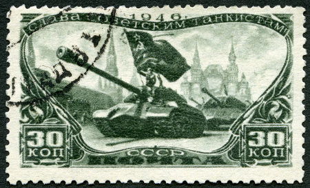 USSR - CIRCA 1946: A stamp printed in USSR shows Tank Divisions in Red Square, series Honoring Soviet tankmen, circa 1946のeditorial素材