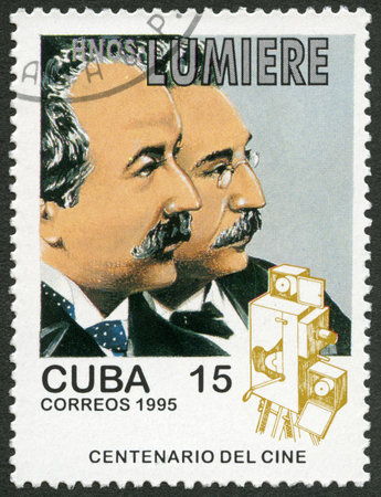 CUBA - CIRCA 1995: A stamp printed in Cuba shows Lumiere Brothers, series Century Motion Pictures, circa 1995のeditorial素材