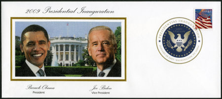 UNITED STATES OF AMERICA - CIRCA 2008: A stamp printed in USA shows an American Flag flying in the breeze at sunset, series Flag 24/7, 44th President Barack Obama and Vice President Joe Biden, circa 2008のeditorial素材