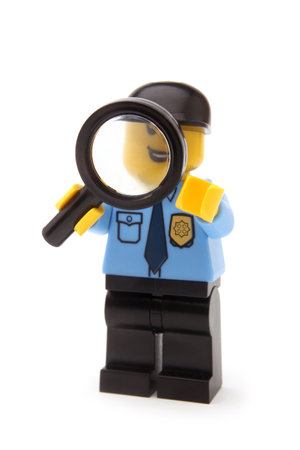 ST. PETERSBURG, RUSSIA - November 15, 2015: A studio shot of a Police Officer Lego minifigure, Lego is a line of plastic construction toys that are manufactured by The Lego Groupのeditorial素材