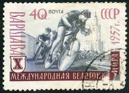USSR - CIRCA 1957: A stamp printed in USSR shows Bicyclist, 10th Peace Bicycle Race in Warsaw, Poland, circa 1957のeditorial素材