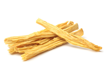 Dried yuba sticks or Fuzhu on white background