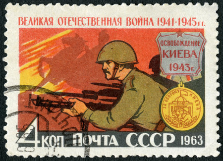 USSR - CIRCA 1963: A stamp printed in USSR shows Defense of Kiev, 1943, series War of Liberation, 1941-1945, circa 1963のeditorial素材