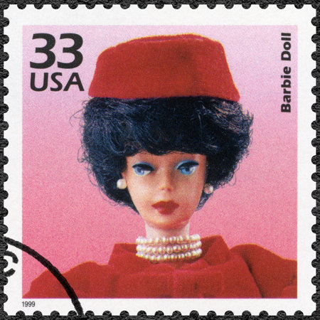 UNITED STATES OF AMERICA - CIRCA 1999: A stamp printed in USA shows Barbie Doll, series Celebrate the Century, 1960s, circa 1999のeditorial素材