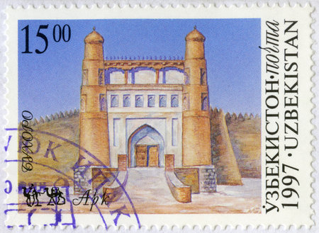 UZBEKISTAN - CIRCA 1997: A stamp printed in Uzbekistan shows Ancient citadel, in Bukhara, Sites on Silk Road, circa 1997のeditorial素材
