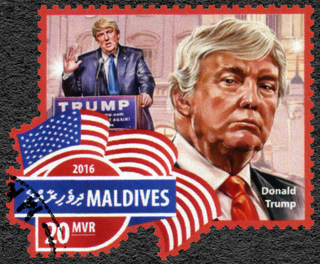 MALDIVES - CIRCA 2016: A stamp printed in Maldives shows Donald John Trump (born 1946) American businessman, politician, and President-elect of the United States, circa 2016のeditorial素材